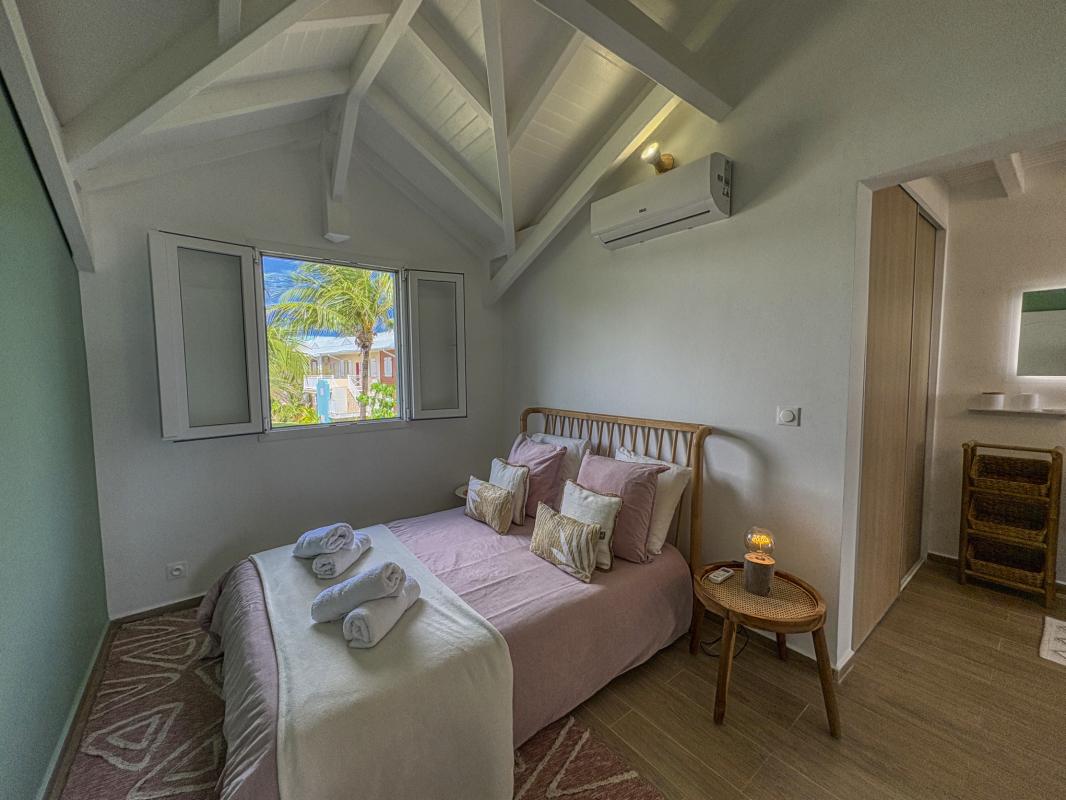 26.Location villa pied dans l'eau Saint François Guadeloupe_Chambre 1 Etage